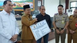 Pemerintah Kota Jambi Menyerahkan Uang Ganti Kerugian pengadaan Tanah Untuk Pembangunan Drainase Utama Revitalisasi Drainase Sungai Asam